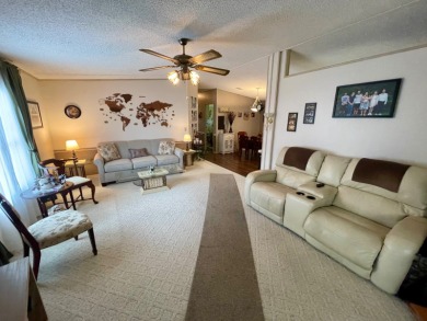 Located on a quiet street with a view of the Golf Course and on Water Oak Country Club Estates in Florida - for sale on GolfHomes.com, golf home, golf lot