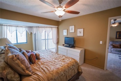 Top-Floor Condo with Golf Course Views, Elevator Access on Tarpon Springs Golf Course in Florida - for sale on GolfHomes.com, golf home, golf lot
