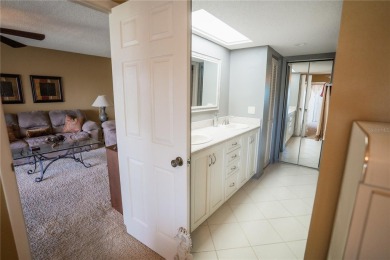 Top-Floor Condo with Golf Course Views, Elevator Access on Tarpon Springs Golf Course in Florida - for sale on GolfHomes.com, golf home, golf lot