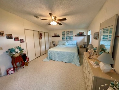 Located on a quiet street with a view of the Golf Course and on Water Oak Country Club Estates in Florida - for sale on GolfHomes.com, golf home, golf lot