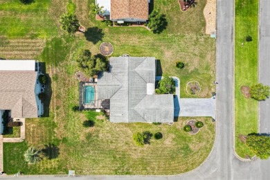 3/2 DOGWOOD WITH A POOL & 4 PERSON HOT TUB!  Located in the on The Links of Spruce Creek in Florida - for sale on GolfHomes.com, golf home, golf lot