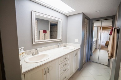 Top-Floor Condo with Golf Course Views, Elevator Access on Tarpon Springs Golf Course in Florida - for sale on GolfHomes.com, golf home, golf lot