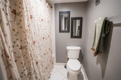Top-Floor Condo with Golf Course Views, Elevator Access on Tarpon Springs Golf Course in Florida - for sale on GolfHomes.com, golf home, golf lot