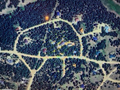 Nicely wood, very buildable lot on San Felipe Circle on Angel Fire Resort Country Club in New Mexico - for sale on GolfHomes.com, golf home, golf lot