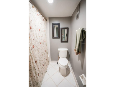 Top-Floor Condo with Golf Course Views, Elevator Access on Tarpon Springs Golf Course in Florida - for sale on GolfHomes.com, golf home, golf lot