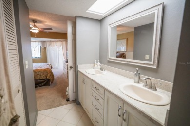 Top-Floor Condo with Golf Course Views, Elevator Access on Tarpon Springs Golf Course in Florida - for sale on GolfHomes.com, golf home, golf lot