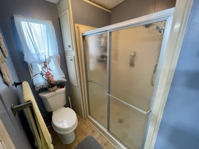 Located on a quiet street with a view of the Golf Course and on Water Oak Country Club Estates in Florida - for sale on GolfHomes.com, golf home, golf lot