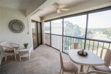 Top-Floor Condo with Golf Course Views, Elevator Access on Tarpon Springs Golf Course in Florida - for sale on GolfHomes.com, golf home, golf lot
