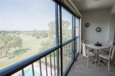 Top-Floor Condo with Golf Course Views, Elevator Access on Tarpon Springs Golf Course in Florida - for sale on GolfHomes.com, golf home, golf lot