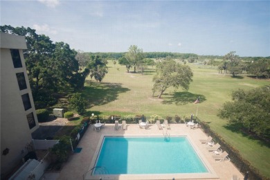 Top-Floor Condo with Golf Course Views, Elevator Access on Tarpon Springs Golf Course in Florida - for sale on GolfHomes.com, golf home, golf lot