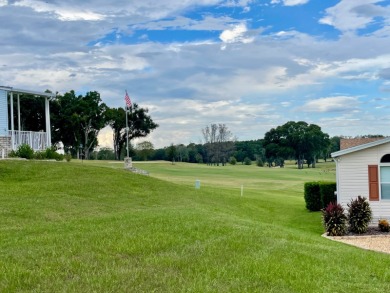 Located on a quiet street with a view of the Golf Course and on Water Oak Country Club Estates in Florida - for sale on GolfHomes.com, golf home, golf lot