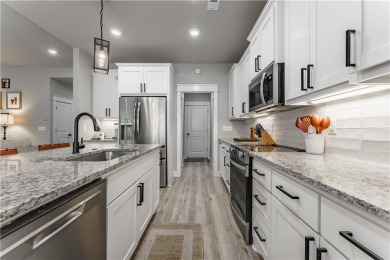 Welcome to this lovely 2-year-old home nestled in a quiet on Bella Vista Country Club - Highlands in Arkansas - for sale on GolfHomes.com, golf home, golf lot