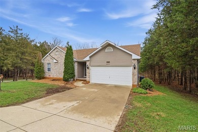 Wake up each morning to the peaceful sounds of hummingbirds and on Raintree Country Club in Missouri - for sale on GolfHomes.com, golf home, golf lot