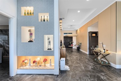 Step into the epitome of luxurious living with this exquisite on Eagle Creek Golf Club in Florida - for sale on GolfHomes.com, golf home, golf lot