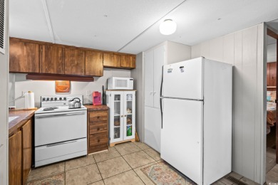 **** As IS****Affordable coastal living! This 3-bedroom, 2-bath on Tidewater Golf Club and Plantation in South Carolina - for sale on GolfHomes.com, golf home, golf lot