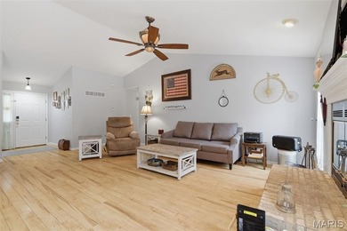 Wake up each morning to the peaceful sounds of hummingbirds and on Raintree Country Club in Missouri - for sale on GolfHomes.com, golf home, golf lot