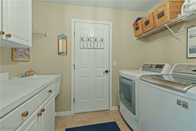 TWIN VILLA WITH HIGHLY DESIRABLE OPEN FLOOR PLAN AND MANY on Colonial Country Club in Florida - for sale on GolfHomes.com, golf home, golf lot