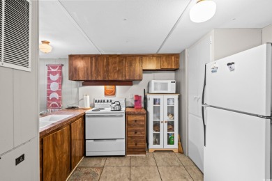**** As IS****Affordable coastal living! This 3-bedroom, 2-bath on Tidewater Golf Club and Plantation in South Carolina - for sale on GolfHomes.com, golf home, golf lot