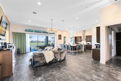 Step into the epitome of luxurious living with this exquisite on Eagle Creek Golf Club in Florida - for sale on GolfHomes.com, golf home, golf lot