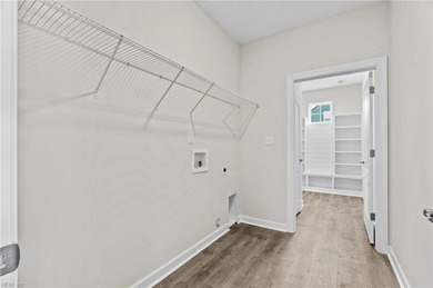 Welcome to the Boardwalk, a stylish, one-level home with modern on Sound Golf Links at Albemarle Plantation in North Carolina - for sale on GolfHomes.com, golf home, golf lot