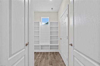 Welcome to the Boardwalk, a stylish, one-level home with modern on Sound Golf Links at Albemarle Plantation in North Carolina - for sale on GolfHomes.com, golf home, golf lot