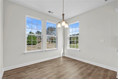 Welcome to the Boardwalk, a stylish, one-level home with modern on Sound Golf Links at Albemarle Plantation in North Carolina - for sale on GolfHomes.com, golf home, golf lot