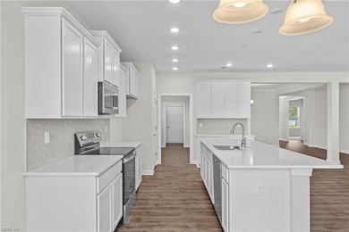 Welcome to the Boardwalk, a stylish, one-level home with modern on Sound Golf Links at Albemarle Plantation in North Carolina - for sale on GolfHomes.com, golf home, golf lot