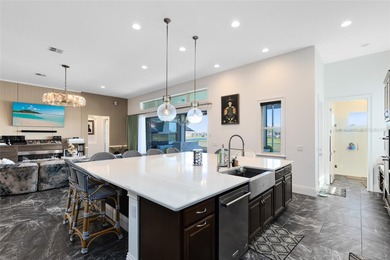 Step into the epitome of luxurious living with this exquisite on Eagle Creek Golf Club in Florida - for sale on GolfHomes.com, golf home, golf lot