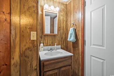 **** As IS****Affordable coastal living! This 3-bedroom, 2-bath on Tidewater Golf Club and Plantation in South Carolina - for sale on GolfHomes.com, golf home, golf lot