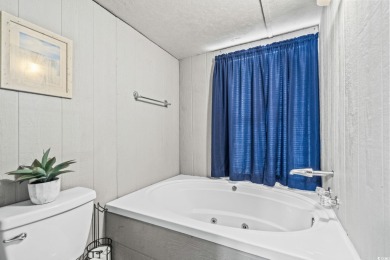 **** As IS****Affordable coastal living! This 3-bedroom, 2-bath on Tidewater Golf Club and Plantation in South Carolina - for sale on GolfHomes.com, golf home, golf lot
