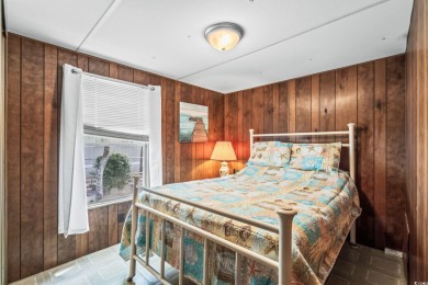 **** As IS****Affordable coastal living! This 3-bedroom, 2-bath on Tidewater Golf Club and Plantation in South Carolina - for sale on GolfHomes.com, golf home, golf lot