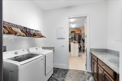 Step into the epitome of luxurious living with this exquisite on Eagle Creek Golf Club in Florida - for sale on GolfHomes.com, golf home, golf lot