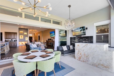 Step into the epitome of luxurious living with this exquisite on Eagle Creek Golf Club in Florida - for sale on GolfHomes.com, golf home, golf lot