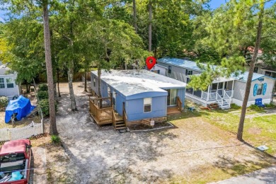 **** As IS****Affordable coastal living! This 3-bedroom, 2-bath on Tidewater Golf Club and Plantation in South Carolina - for sale on GolfHomes.com, golf home, golf lot