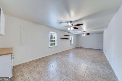 This lovely ranch is a meticulously maintained three-bedroom on Collins Hill Golf Club in Georgia - for sale on GolfHomes.com, golf home, golf lot