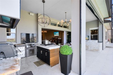 Step into the epitome of luxurious living with this exquisite on Eagle Creek Golf Club in Florida - for sale on GolfHomes.com, golf home, golf lot