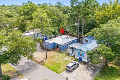 **** As IS****Affordable coastal living! This 3-bedroom, 2-bath on Tidewater Golf Club and Plantation in South Carolina - for sale on GolfHomes.com, golf home, golf lot