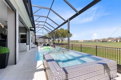 Step into the epitome of luxurious living with this exquisite on Eagle Creek Golf Club in Florida - for sale on GolfHomes.com, golf home, golf lot