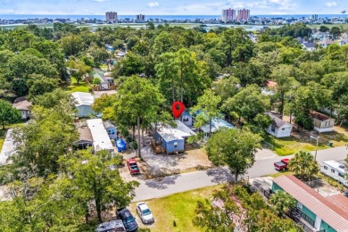 **** As IS****Affordable coastal living! This 3-bedroom, 2-bath on Tidewater Golf Club and Plantation in South Carolina - for sale on GolfHomes.com, golf home, golf lot