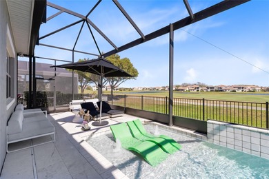 Step into the epitome of luxurious living with this exquisite on Eagle Creek Golf Club in Florida - for sale on GolfHomes.com, golf home, golf lot