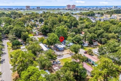 **** As IS****Affordable coastal living! This 3-bedroom, 2-bath on Tidewater Golf Club and Plantation in South Carolina - for sale on GolfHomes.com, golf home, golf lot