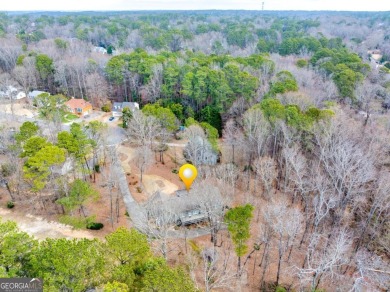 This lovely ranch is a meticulously maintained three-bedroom on Collins Hill Golf Club in Georgia - for sale on GolfHomes.com, golf home, golf lot