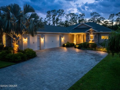 Enjoy peaceful water and wooded views in this beautifully on Venetian Bay Golf Course in Florida - for sale on GolfHomes.com, golf home, golf lot