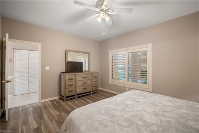 Experience the Ultimate in Tropical Living! Enjoy serene lake on Club at Pelican Bay Golf Course in Florida - for sale on GolfHomes.com, golf home, golf lot