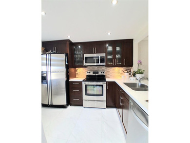 FULLY REMODELED LAKE FRONT-CONDO located in the heart of on Sunrise Lakes Phase IV Golf Course in Florida - for sale on GolfHomes.com, golf home, golf lot