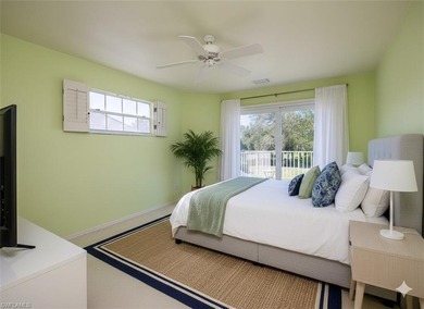 Discover tranquility in this exquisite Avignon model, a on Club at Pelican Bay Golf Course in Florida - for sale on GolfHomes.com, golf home, golf lot