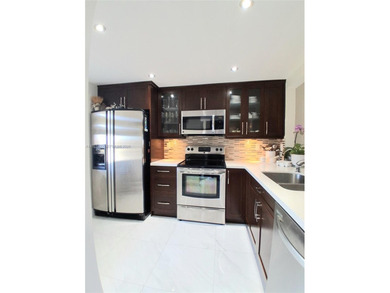 FULLY REMODELED LAKE FRONT-CONDO located in the heart of on Sunrise Lakes Phase IV Golf Course in Florida - for sale on GolfHomes.com, golf home, golf lot