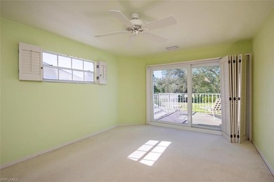 Discover tranquility in this exquisite Avignon model, a on Club at Pelican Bay Golf Course in Florida - for sale on GolfHomes.com, golf home, golf lot