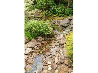 This one-of-a-kind, beautifully maintained four-bedroom on Lake Toxaway Country Club in North Carolina - for sale on GolfHomes.com, golf home, golf lot