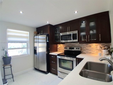 FULLY REMODELED LAKE FRONT-CONDO located in the heart of on Sunrise Lakes Phase IV Golf Course in Florida - for sale on GolfHomes.com, golf home, golf lot